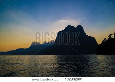Beautiful sunset and sea and mountain looklike island in Suratthani Thailand.