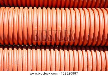 Cool background. A large amount of red tubes, picture may be used as a background