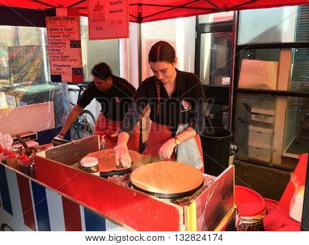 AUCKLANDJUNE 4: Cook prepare French crepe a thin pancake usually made from wheat flour at the La Cigale French Market in Auckland New Zealand on June 4 2016.