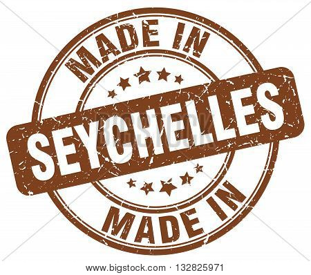 made in Seychelles brown round vintage stamp.Seychelles stamp.Seychelles seal.Seychelles tag.Seychelles.Seychelles sign.Seychelles.Seychelles label.stamp.made.in.made in.