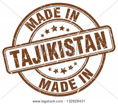 made in Tajikistan brown round vintage stamp.Tajikistan stamp.Tajikistan seal.Tajikistan tag.Tajikistan.Tajikistan sign.Tajikistan.Tajikistan label.stamp.made.in.made in.
