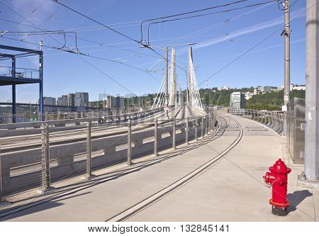Tillikum crossing bridge and railtracks Portland Oregon.