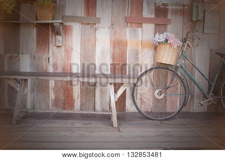 Bicycle Vintage.Wood background Textured with bicycle art