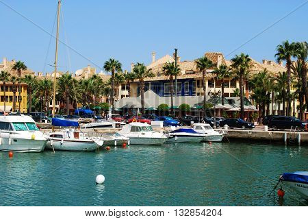 PUERTO SOTOGRANDE, SPAIN - JULY 18, 2008 - Yachts and boats in the marina with buildings to the rear Puerto Sotogrande Cadiz Province Andalucia Spain Western Europe, July 18, 2008.