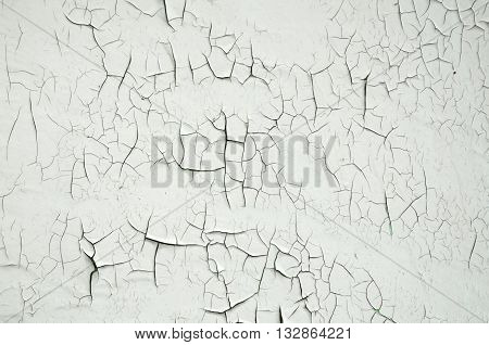 The texture of the old damaged walls with paint