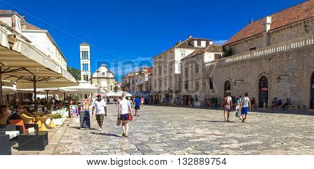 HVAR, CROATIA - JULY 1, 2009: Unidentified people on the street of Stari Grad Hvar Croatia. Stari Grad (Pharos) is the oldest town in Croatia.