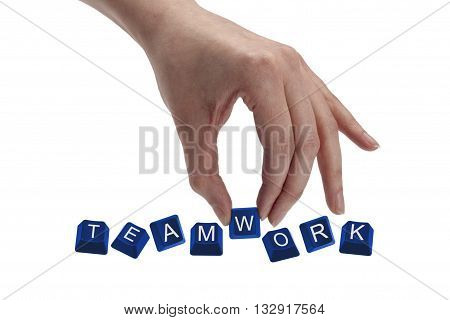 keys spelling the word teamwork isolated on white background