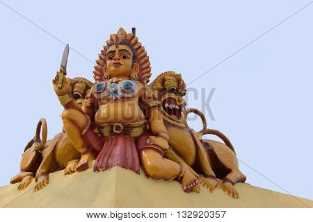 Chettinad India - October 17 2013: Statue of female Bootha Gana on the wall at Mariamman temple in Kothamargalam. She defends Lord Shiva and his family.