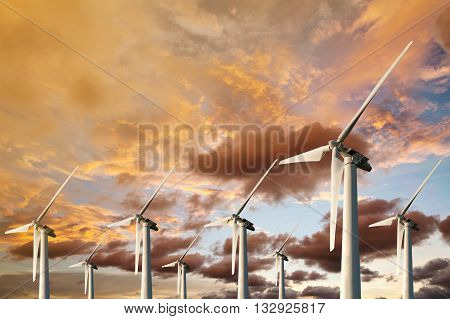 Wind Energy Blows Into Future Amarillo And Turbine Farms On Blue Sunset In Twilight Background