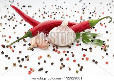 fresh chilli pepper with garlic on white