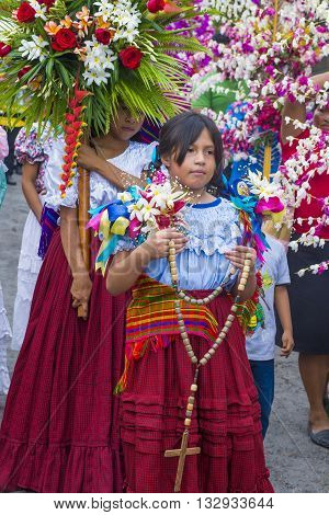 PANCHIMALCO EL SALVADOR - MAY 08 : Salvadorian people participate in the procession of the Flower & Palm Festival in Panchimalco El Salvador on May 08 2016