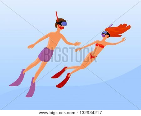 a pair of free divers, man and woman underwater in masks, fins and with snorkels