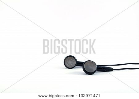 Black headphones with wires on white background