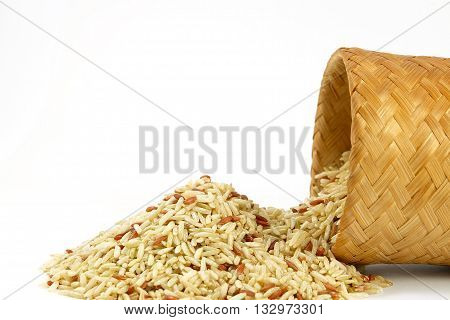 Raw Brown rice in bamboo box (Kratip) on white background