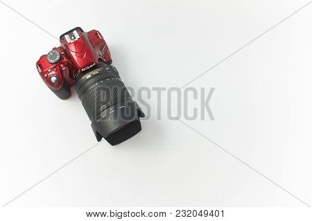 Gomel, Belarus - March 20, 2018: Nikon 3200 Camera In Red On A White Background.