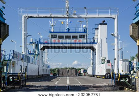 Swinoujscie, West Pomeranian / Poland - 2017: Car Ferry At The Waterfront At The Crossing Into Town