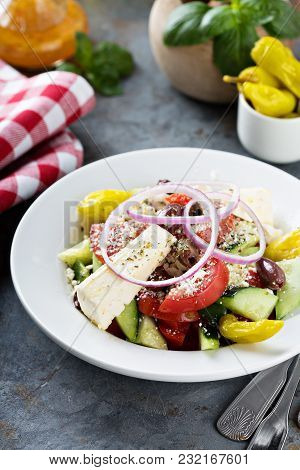 Greek Salad With Fresh Vegetables, Olives And Feta Cheese