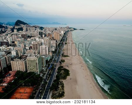 Aerial View Of Ipanema Beach During Sunset, Sun With Clouds. Rio De Janeiro, Brazil