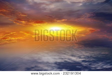 Colorful Sunset . Colorful Clouds With Lens Flare . Beautiful Heavenly Landscape With The Sun In The