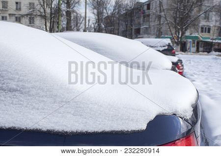 Snow In March. Weather In Moldova On 03/21/2018. Anomaly. Global Warming.  Cars On The Parking Are S