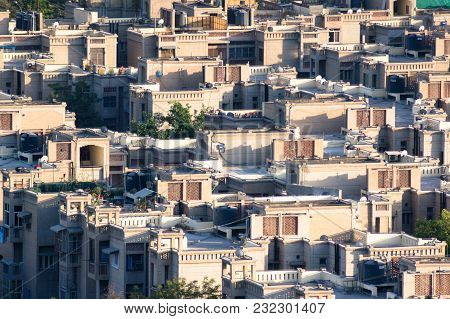 Concrete Residential Houses Built To House The Ever Increasing Population Of Noida, Delhi. The Windo
