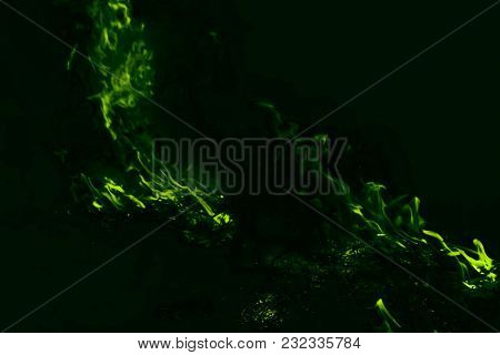 Green Flame. Fire. Burning Of Rice Straw At Night.
