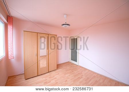 Detail Of A Room With A Wardrobe