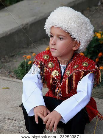 Ashgabat, Turkmenistan - September, 12, 2017.  Portrait Of  Unidentified Serious  Asian Boy.  Boy In