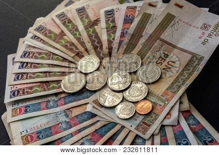 Cuban Convertible Pesos (cuc) On The Table. Cuban Convertible Banknotes And Coins