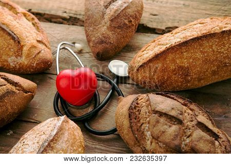 Lot Different Bread On Wooden Table With Heart Shaped Figure. Concept Of Healthy Lifestyle, Gluten F