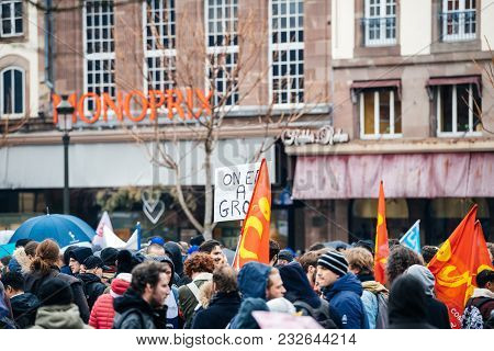 Strasbourg, France  - Mar 22, 2018: Crowd With Flags In Place Kleber At Demonstration Protest Agains