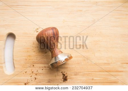 Coffee Tamper For Coffee On A Wooden Board