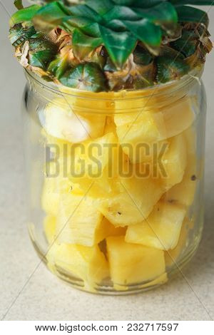 Fresh Juicy Pineapple Pieces In A Glass Jar