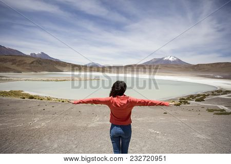 Young Woman At Laguna Hedionda At Andean Altiplano In Bolivia
