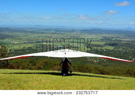 Hang-glider Taking Off A Mountain Top In Australia.