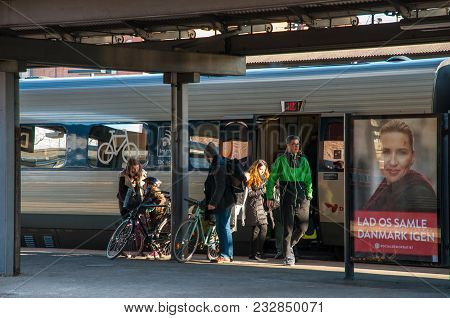 Roskilde Denmark - February 24. 2018: People Leaving The Train At Roskilde Train Station In Denmark