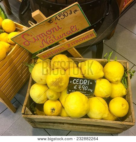 Natural Lemons In A Wooden Box Offered For Sale In Italy