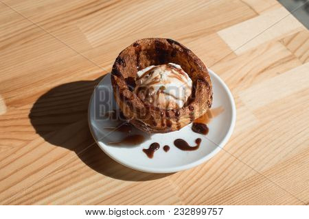 Traditional Mexican Dessert Churros Served With Ice Cream On White Plate On Wooden Table.