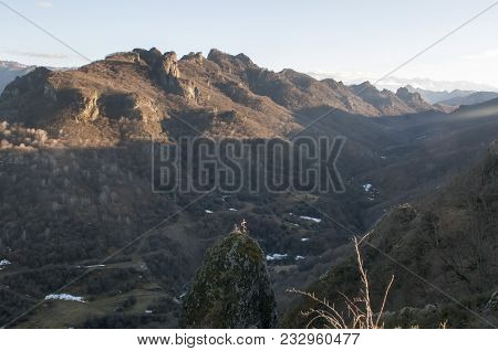 Beautiful Old Cross In Mountain Burial. The Mountainous Landscape Of The North Caucasus
