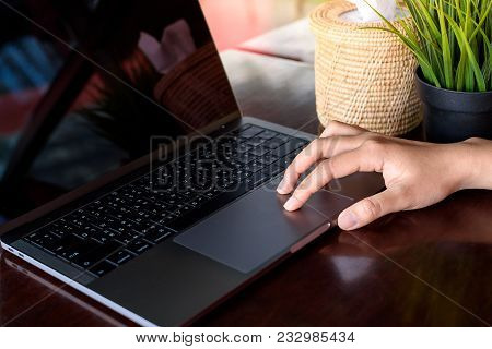 Typing Keyborad Of Laptop On The Table