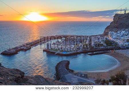 Aerial View Of Bay In Puerto De Mogan In Gran Canaria Island, During Sunset.
