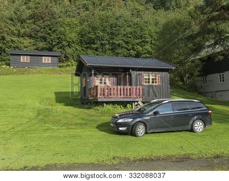 Storen, Norway, September 7, 2019: View Of Classical Norwegian Camping Site With Traditional Wooden 
