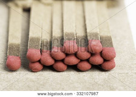 A Macro Shot Of An Open And Partially Used Matchbook.