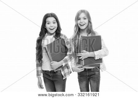 Pads Perfect For The Academic Use. Cute Small School Children Holding Note Pads. Adorable Little Gir
