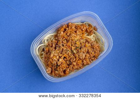 Pasta With Minced Meat And Onion In Navy-style On A Blue Background.