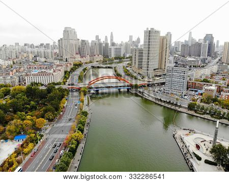 Aerial View Of Tianjin Cityscape With Haihe River And Skyscrapers. Urban Architectural Landscape Of 