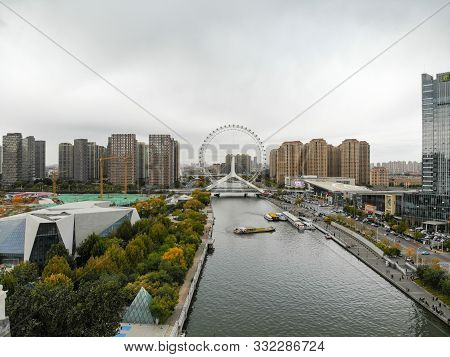 Aerial View Of Tianjin Cityscape With Haihe River And Skyscrapers. Urban Architectural Landscape Of 