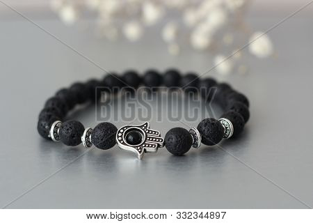 Fashionable Bracelets With Lava Stone And Pendants Hamsa