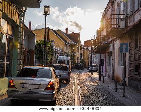 European Narrow Street. Old Buildings And Stone Pavemant In The In Batumi. Evening Sun Rays. Georgia