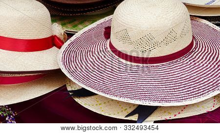 Colorful Handmade Panama Hats Or Paja Toquilla Hats Or Sombrero At The Traditional Outdoor Market In